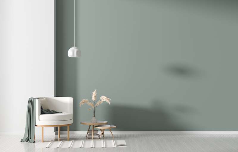 Empty wall in Scandinavian style interior with armchair. Minimalist interior design. 3D illustration.